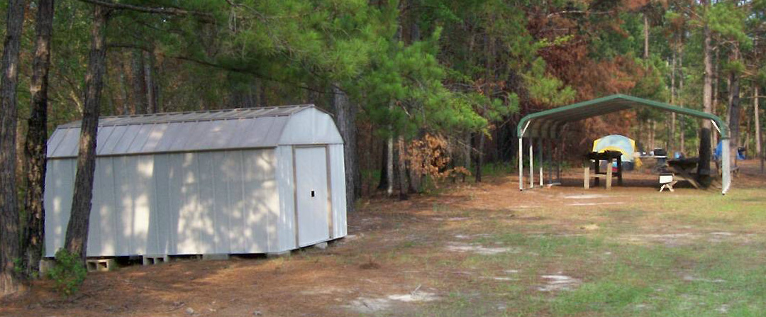 he new storage shed and picnic pavilion, with tents in the background